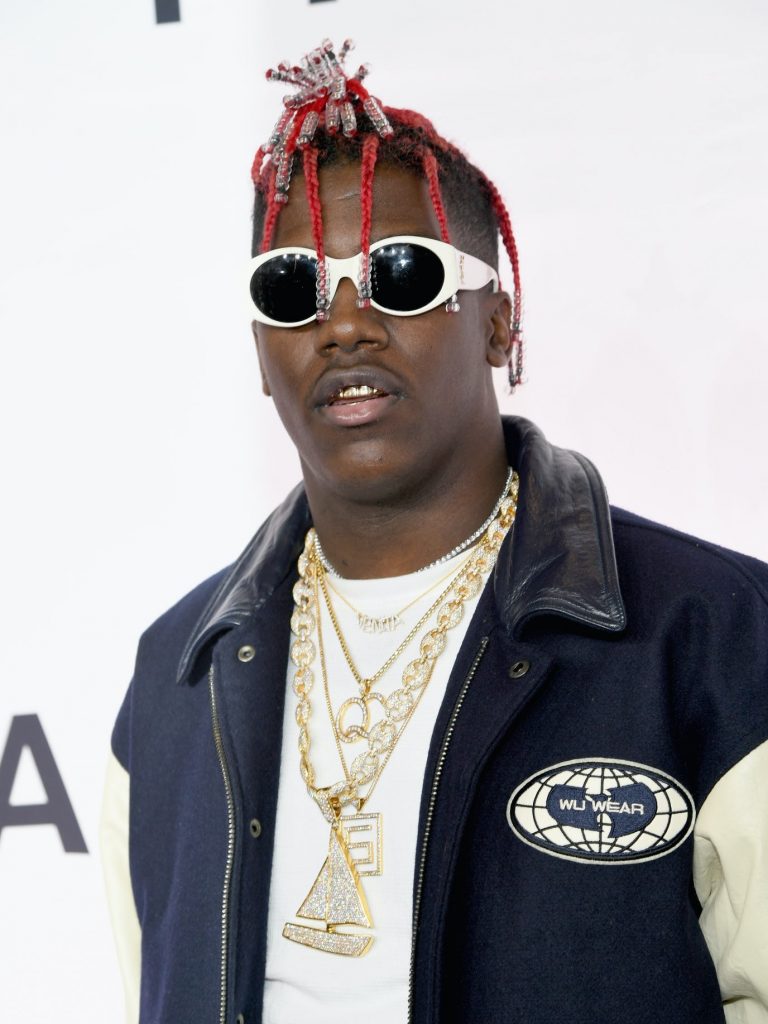Lil Yachty attends TIDAL X: 1015 on October 15, 2016 in New York City wearing round white sunglasses. photo: Larry Busacca